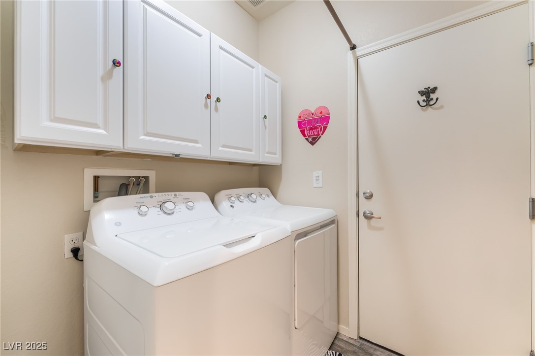 4732 Adriano Way Pahrump, NV 89061 - Photo 34 of 44 Washroom with cabinet space and washer and dryer