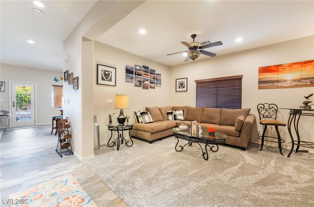 4732 Adriano Way Pahrump, NV 89061 - Photo 6 of 44 Living room with recessed lighting, wood finished floors, and ceiling fan