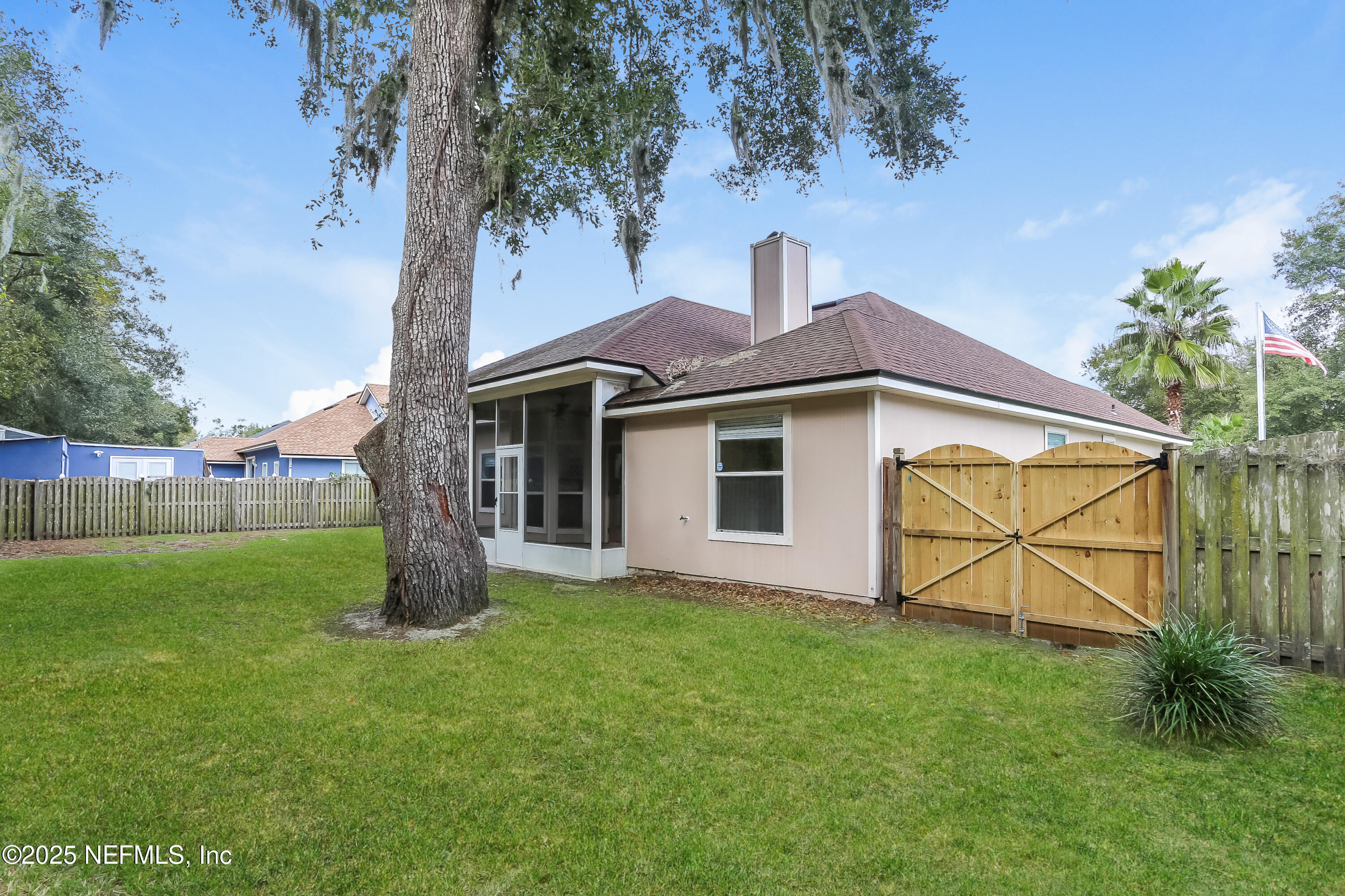 86293 Fieldstone Drive Yulee, FL 32097 - Photo 14 of 15 a front view of a house with garden