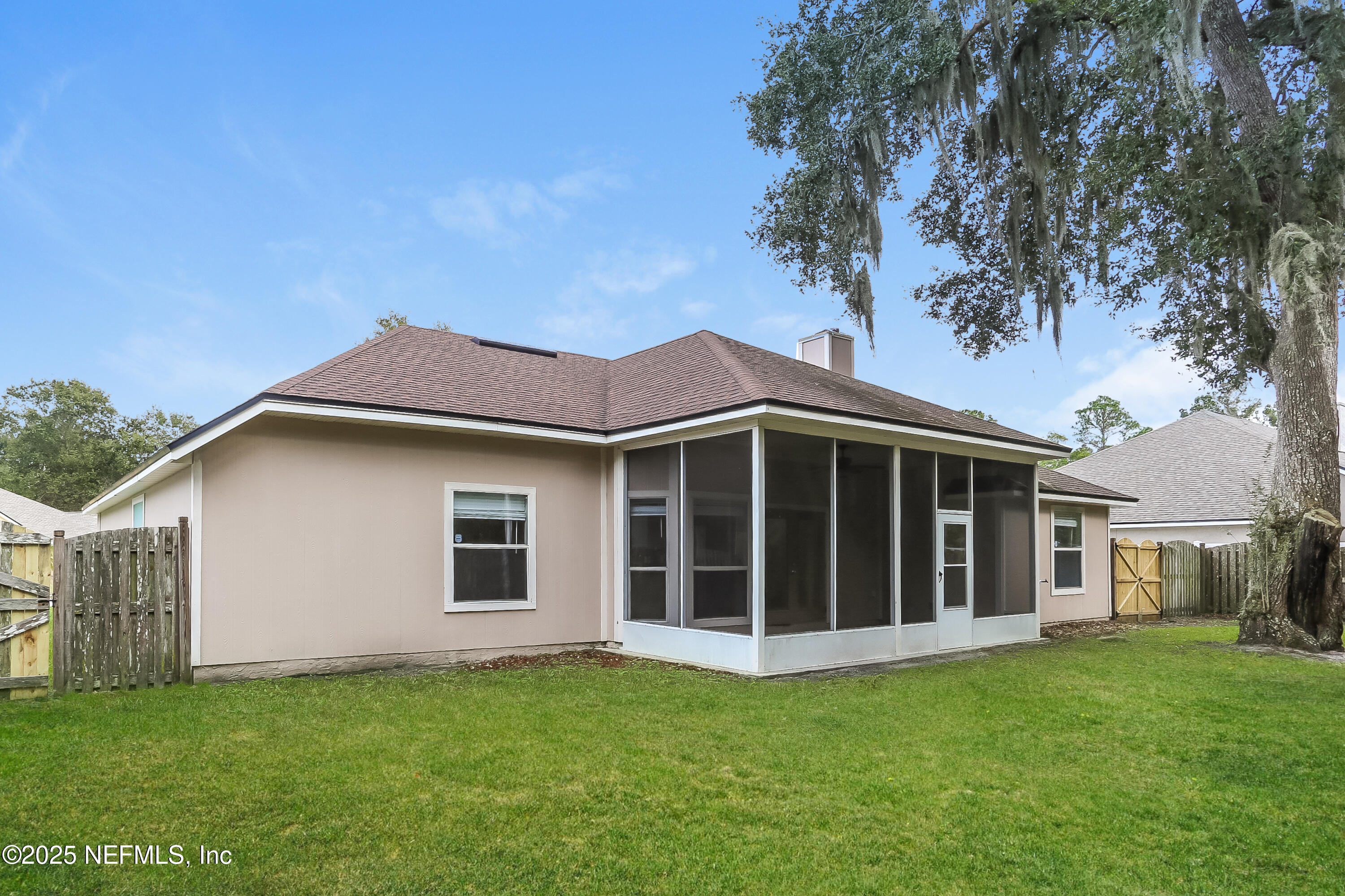 86293 Fieldstone Drive Yulee, FL 32097 - Photo 15 of 15 a view of a house with a yard
