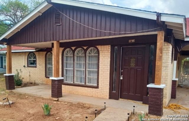 a front view of a house with a porch