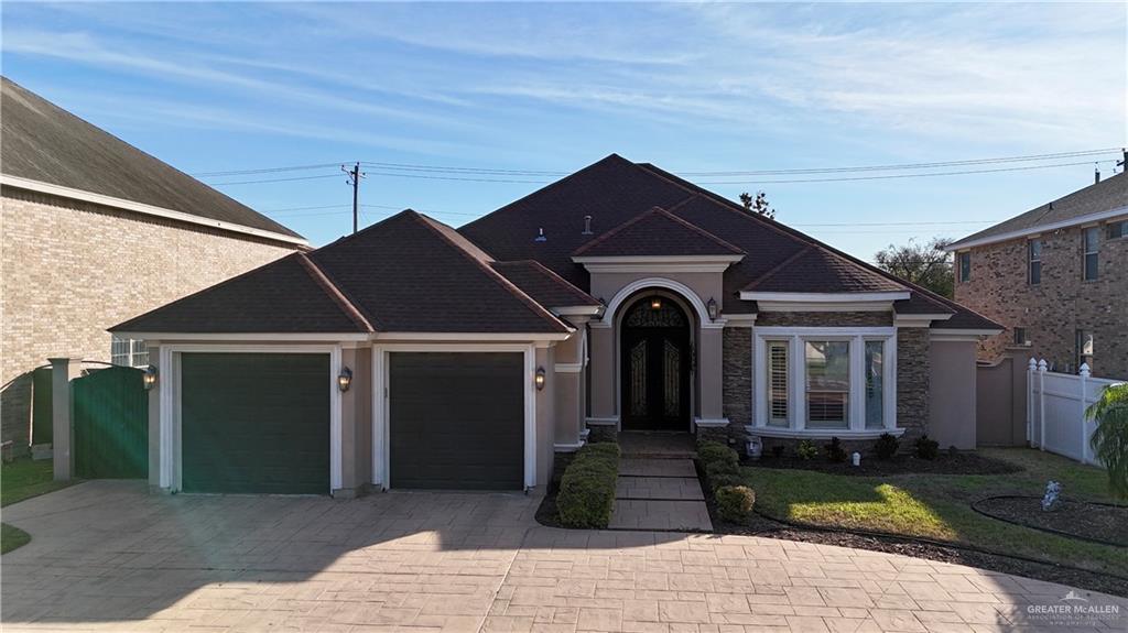 4101 Tyler Avenue McAllen, TX 78503 - Photo 2 of 12 a front view of a house with garden