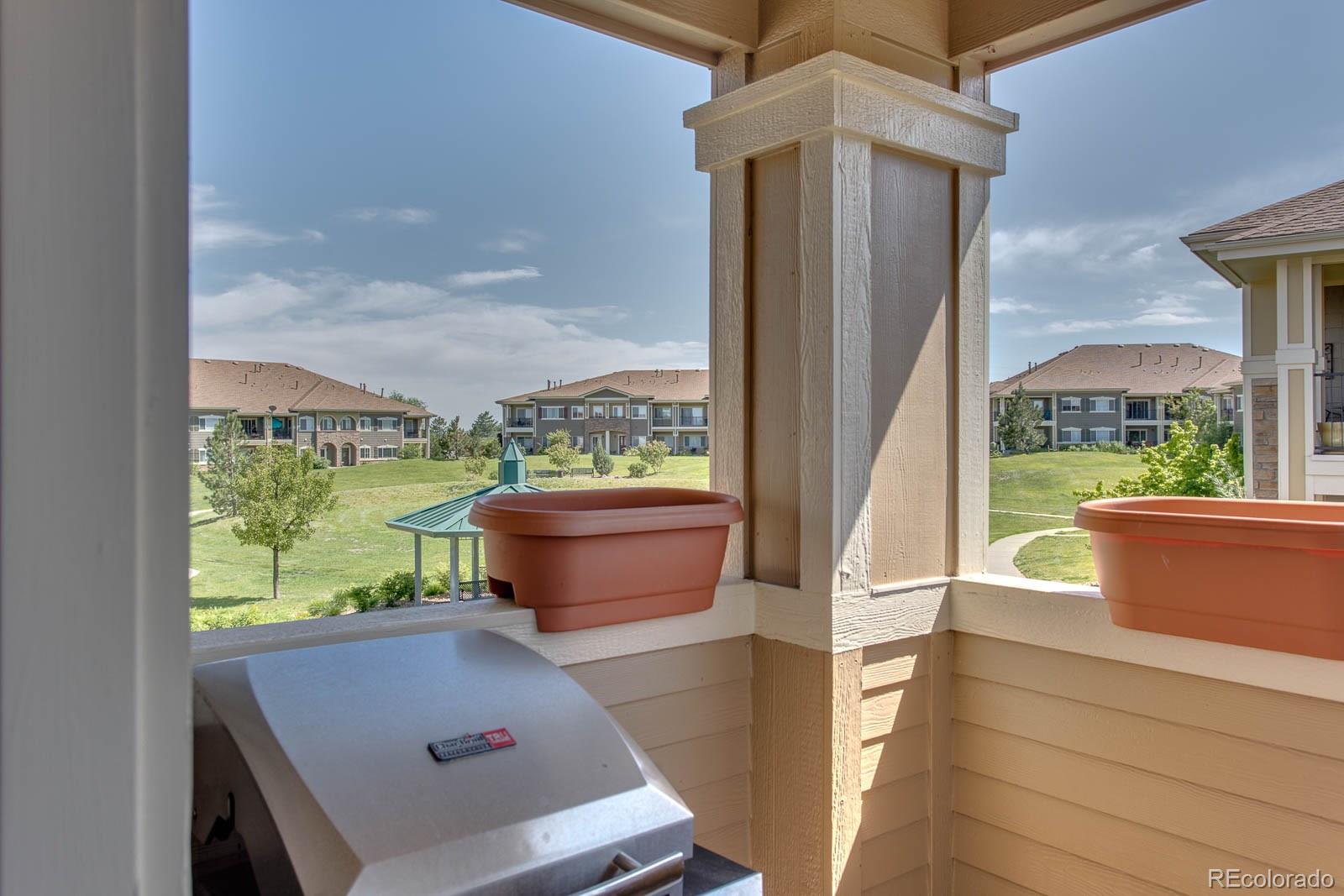 6292 Kilmer Loop, Unit 204 Arvada, CO 80403 - Photo 23 of 25 a view of an outdoor sitting space