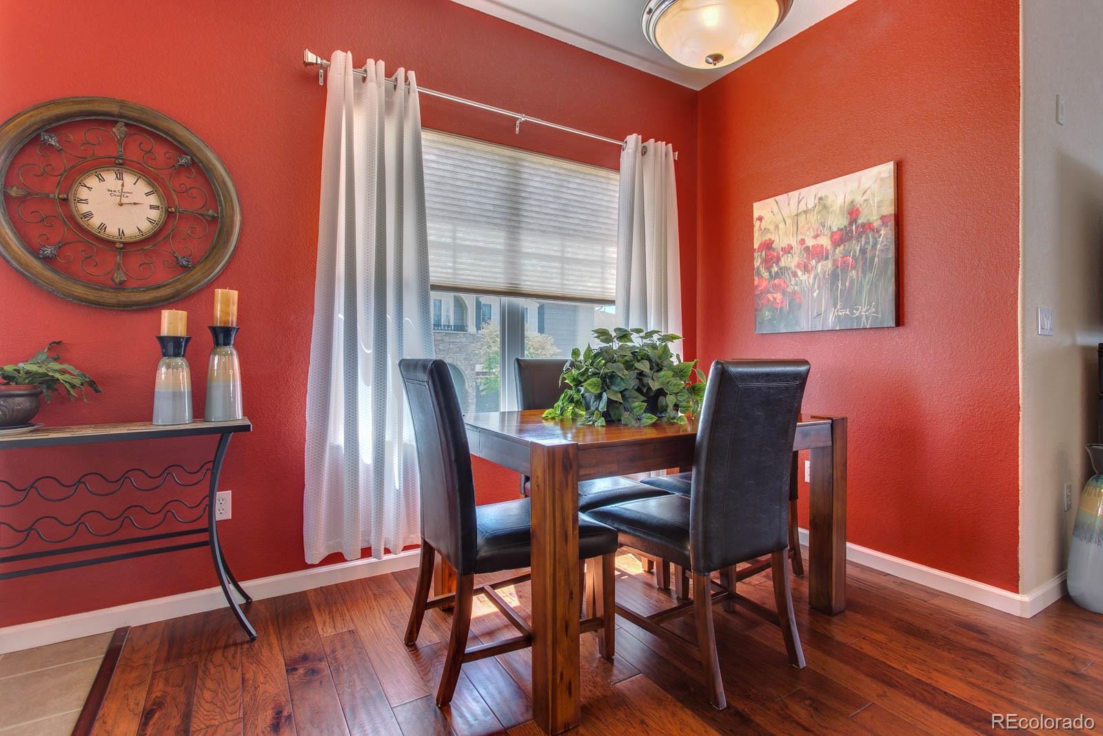 6292 Kilmer Loop, Unit 204 Arvada, CO 80403 - Photo 7 of 25 a dining room with furniture and window