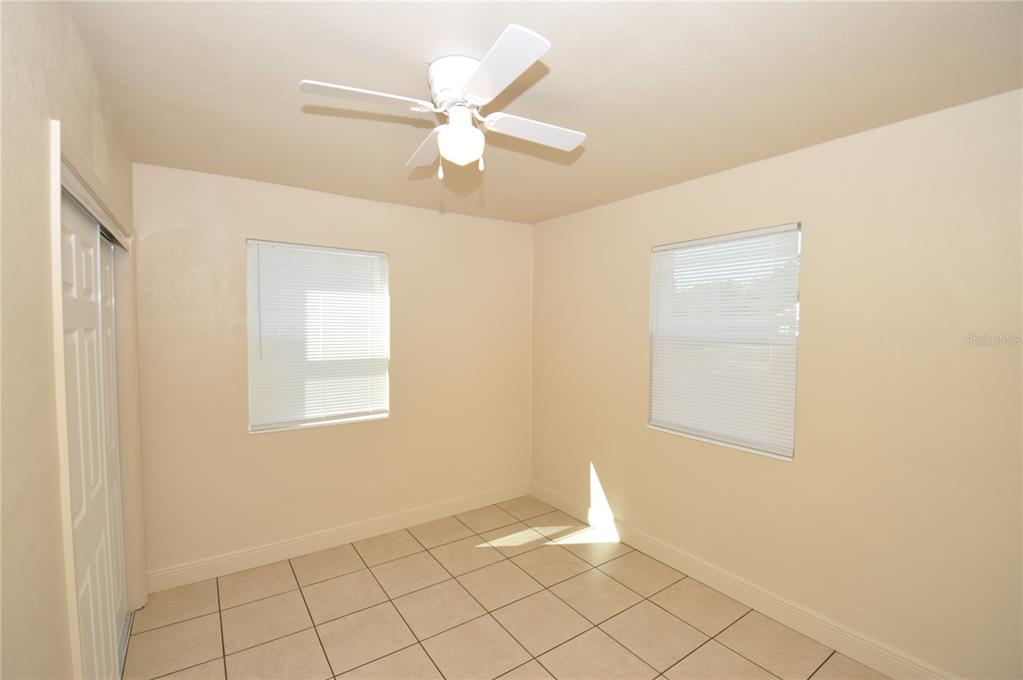 1445 East Stuart Street Bartow, FL 33830 - Photo 8 of 18 a view of an empty room with window