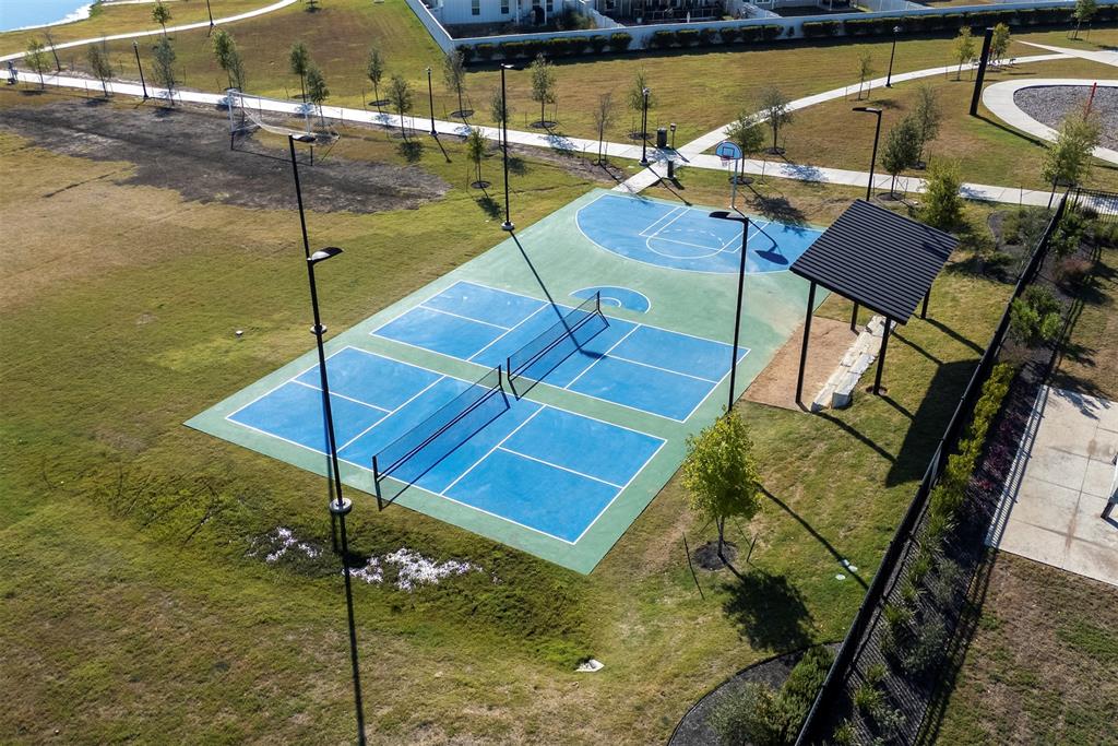 194 Heritage Ml Trail Elgin, TX 78621 - Photo 18 of 25 a view of a swimming pool with seating area