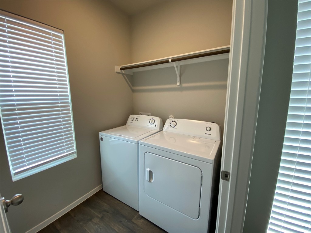 194 Heritage Ml Trail Elgin, TX 78621 - Photo 9 of 25 a utility room with dryer and washer