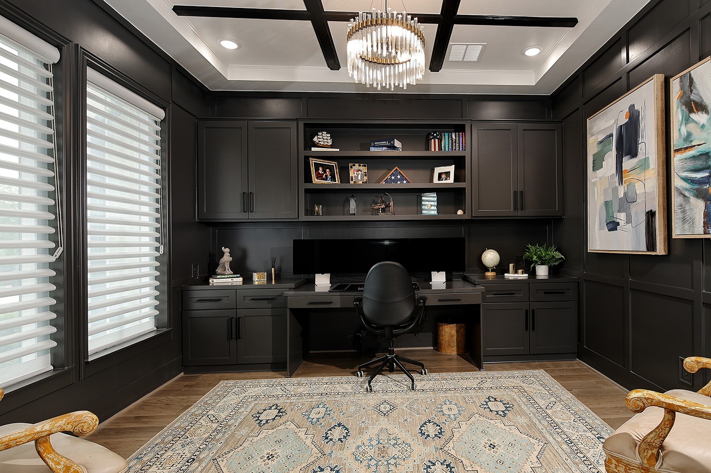 2017 Bennet Lane Conroe, TX 77384 - Photo 9 of 48 Stunning office in the hall featuring rich dark tones contrasted with elegant white picture frame molding, creating a sophisticated and dramatic space.