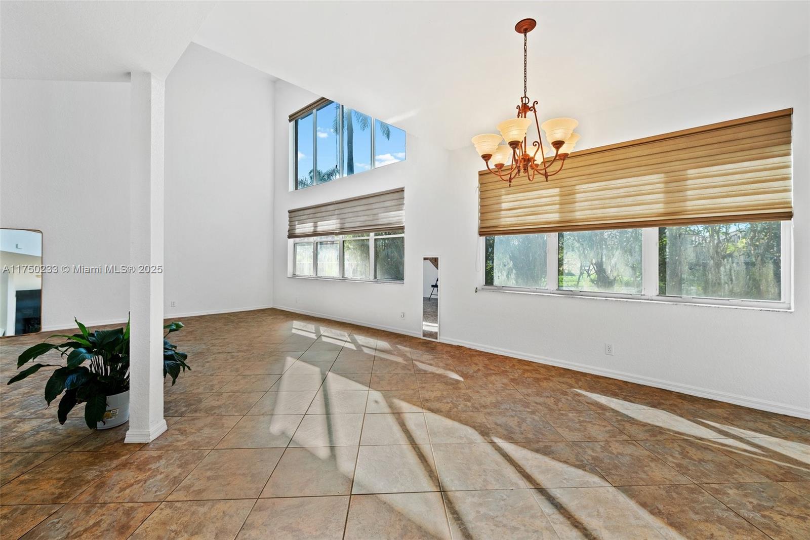 Mission Bay Boca Raton, FL 33498 - Photo 13 of 13 a view of livingroom with furniture and floor to ceiling window
