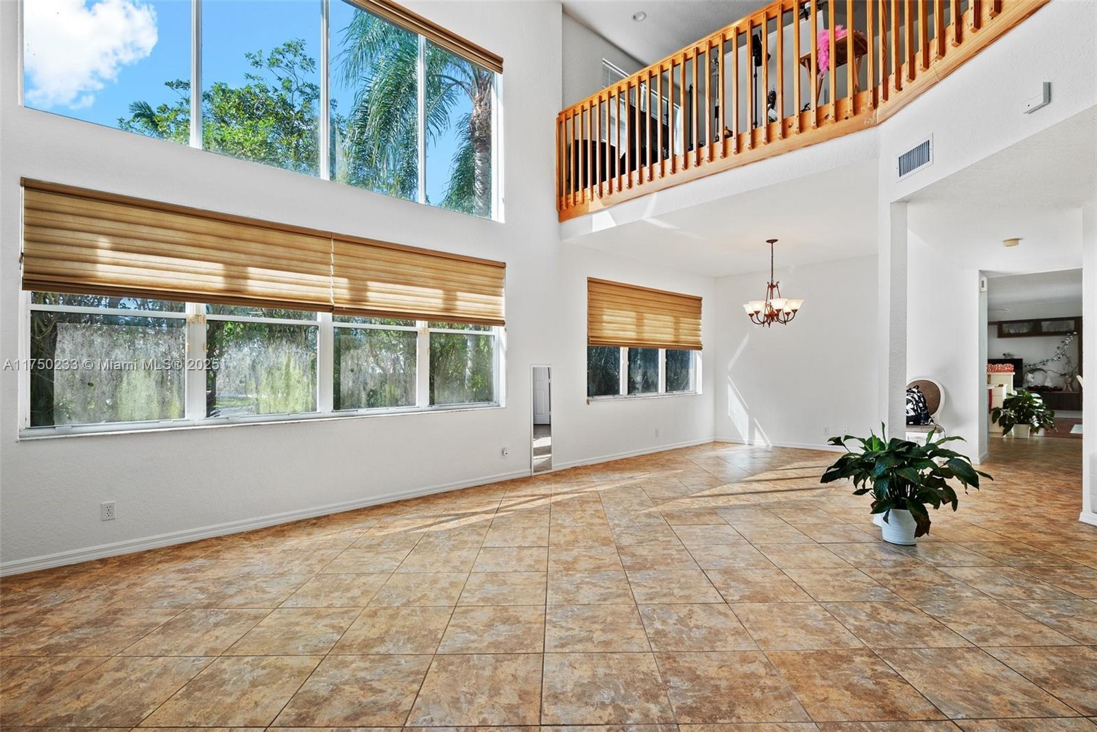 Mission Bay Boca Raton, FL 33498 - Photo 8 of 13 a view of an entryway with flower plants