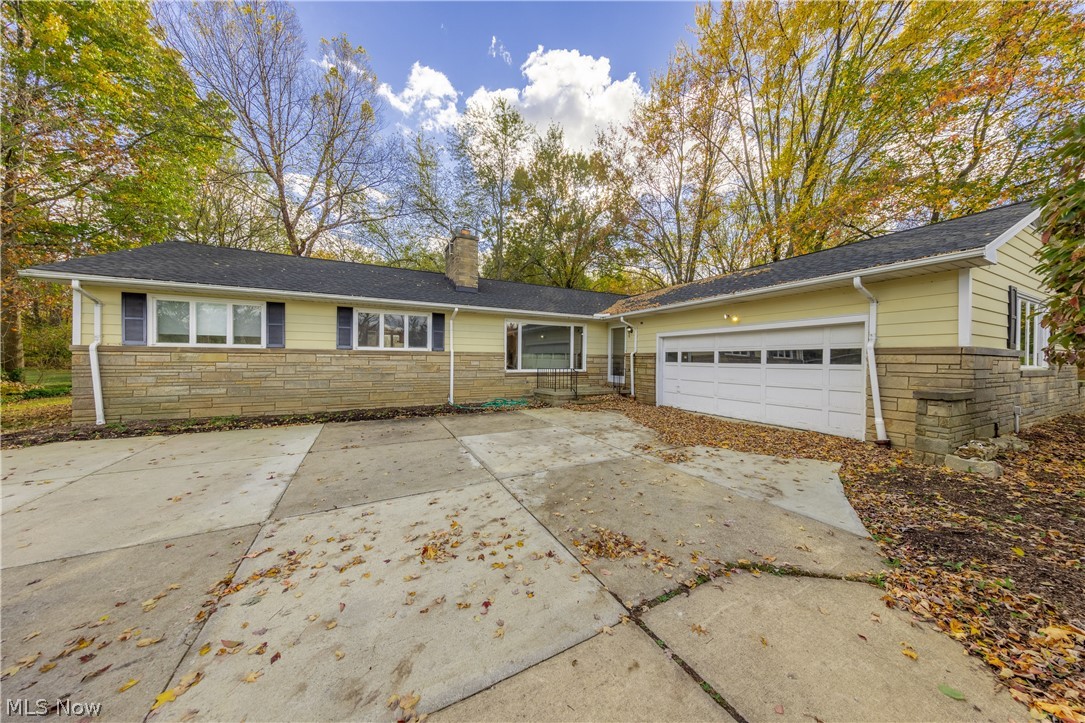 29776 South Woodland Road Cleveland, OH 44124 - Photo 1 of 1 This handsome, 3-Bedroom ranch is deceptively large and is nestled away from the street in beautiful wooded grounds.