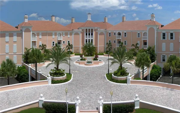 a view of a patio with couches and potted plants