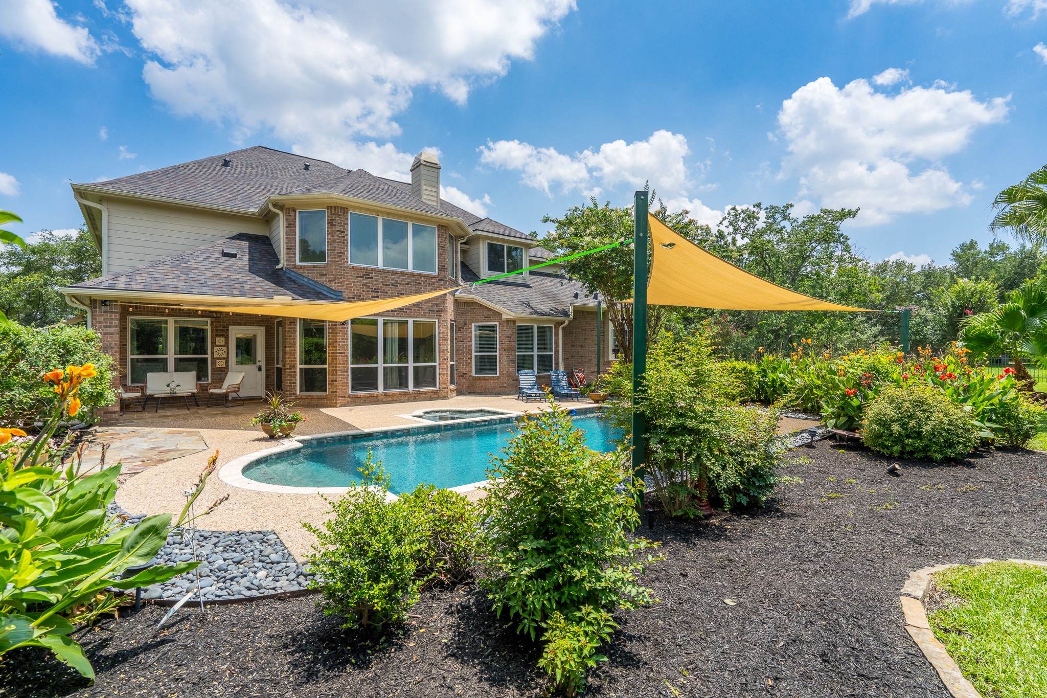 5914 Oakmoss Trail Spring, TX 77379 - Photo 34 of 50 This home is ready to become yours! Just imagine entertaining friends and family while spending summer days in the glorious backyard oasis overlooking the 18th hole of Windrose Golf Course!