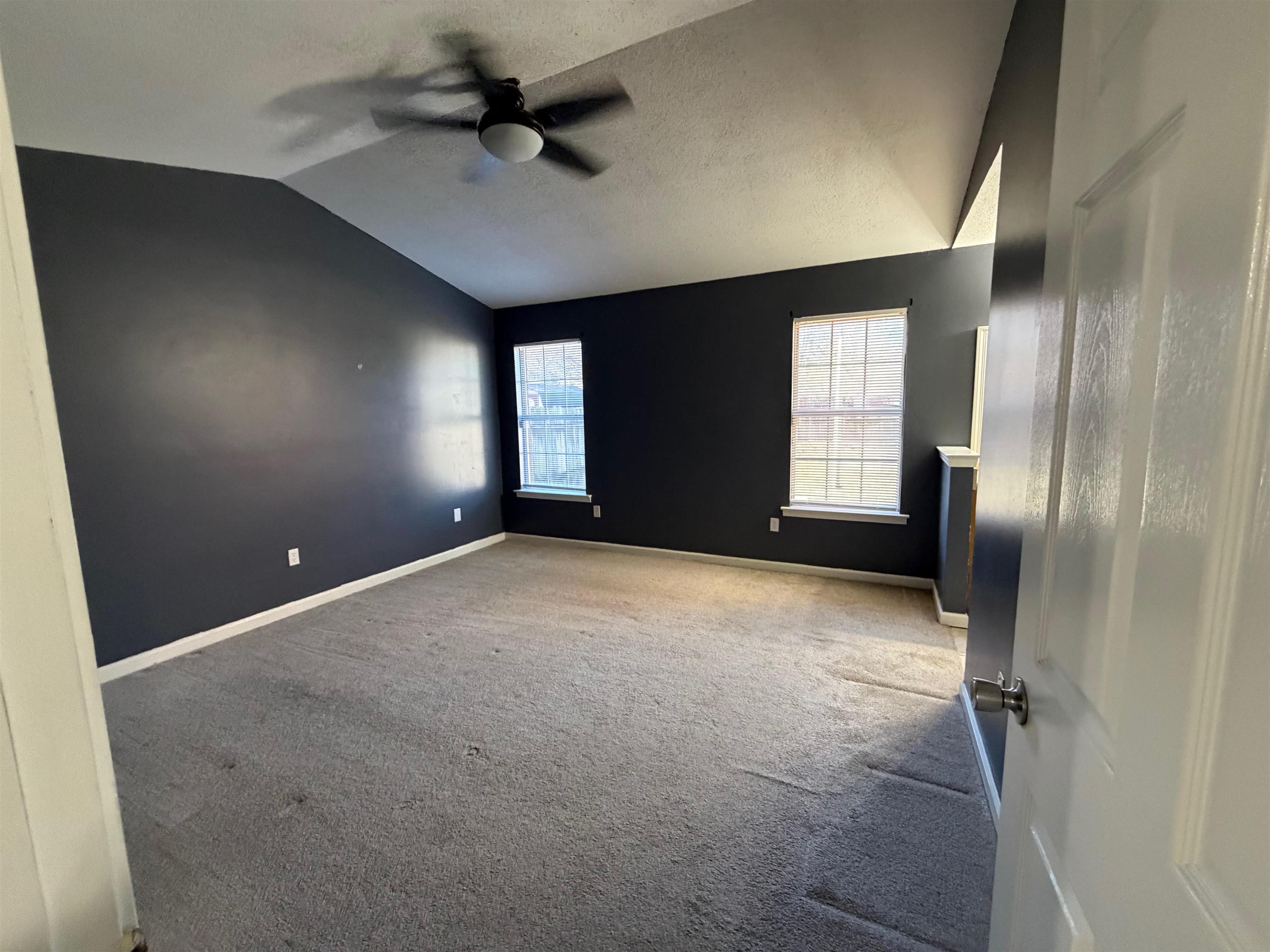 5901 Garden Ridge Drive Millington, TN 38053 - Photo 8 of 15 an empty room with windows and fan
