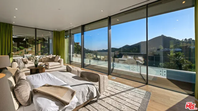 a living room with large windows