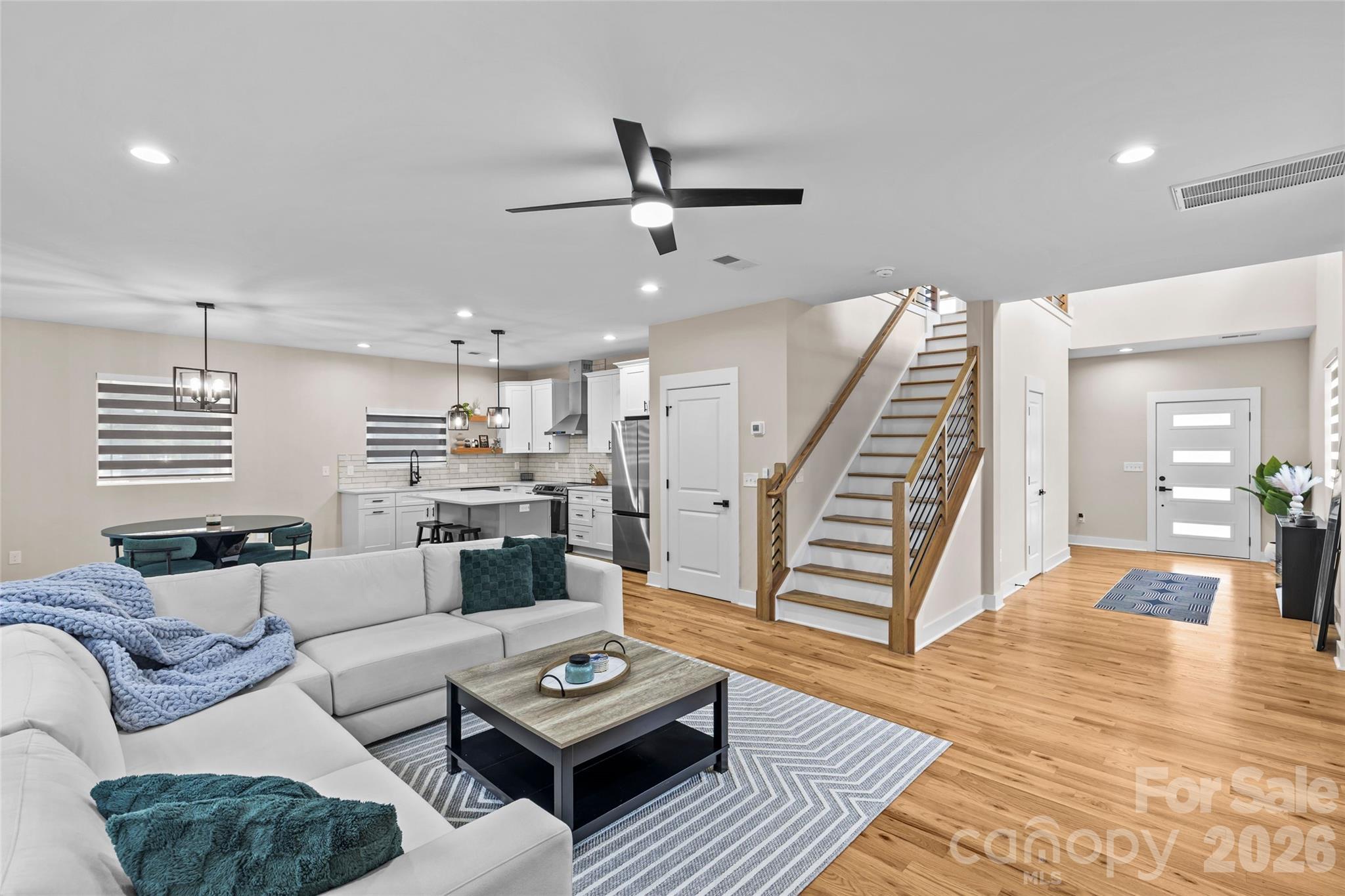 8925 Harrisburg Road Charlotte, NC 28215 - Photo 2 of 37 a living room with furniture and wooden floor