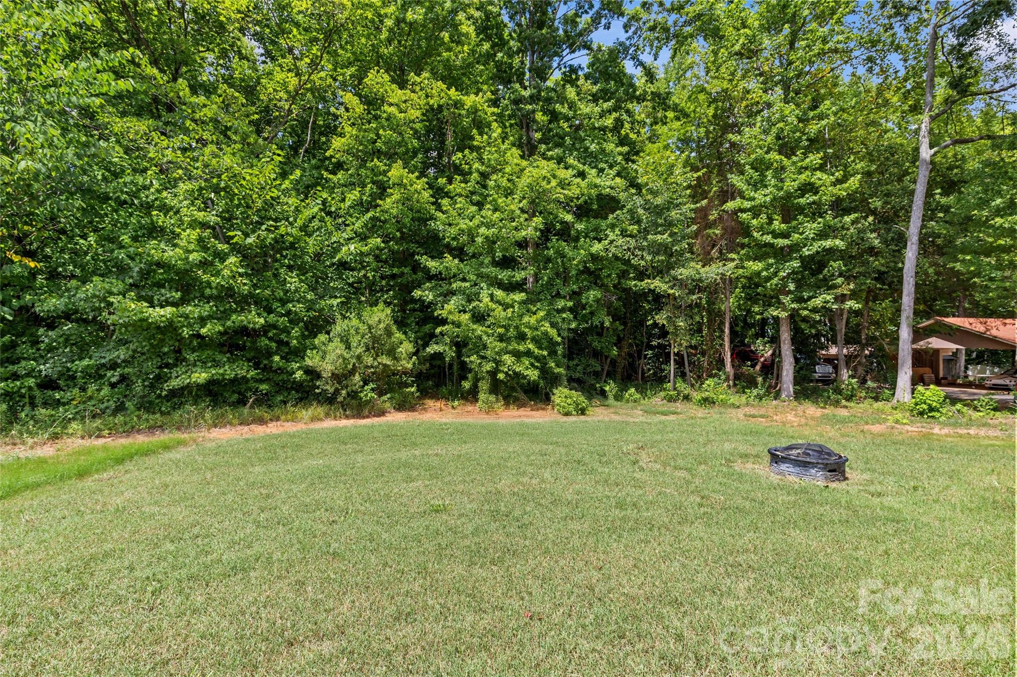 8925 Harrisburg Road Charlotte, NC 28215 - Photo 36 of 37 a view of a trees in a yard