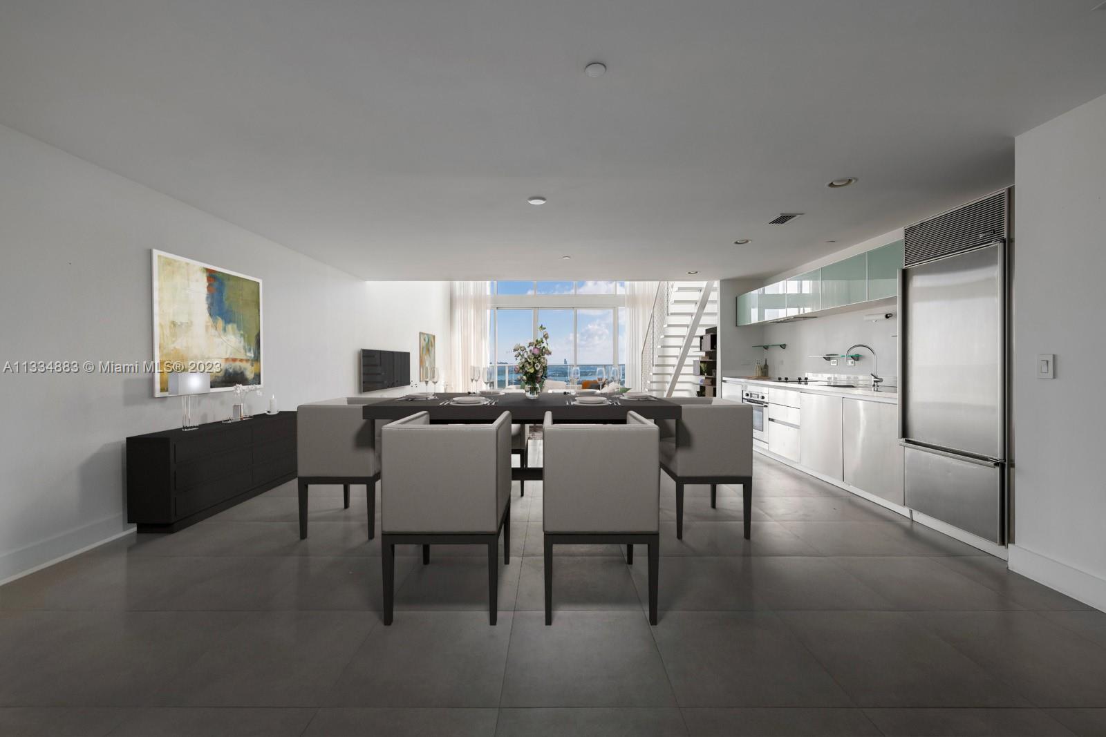 1040 Biscayne Boulevard, Unit 2402 Miami, FL 33132 - Photo 8 of 25 a view of a dining room with furniture