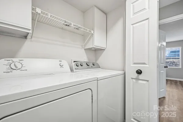 a utility room with dryer and washer