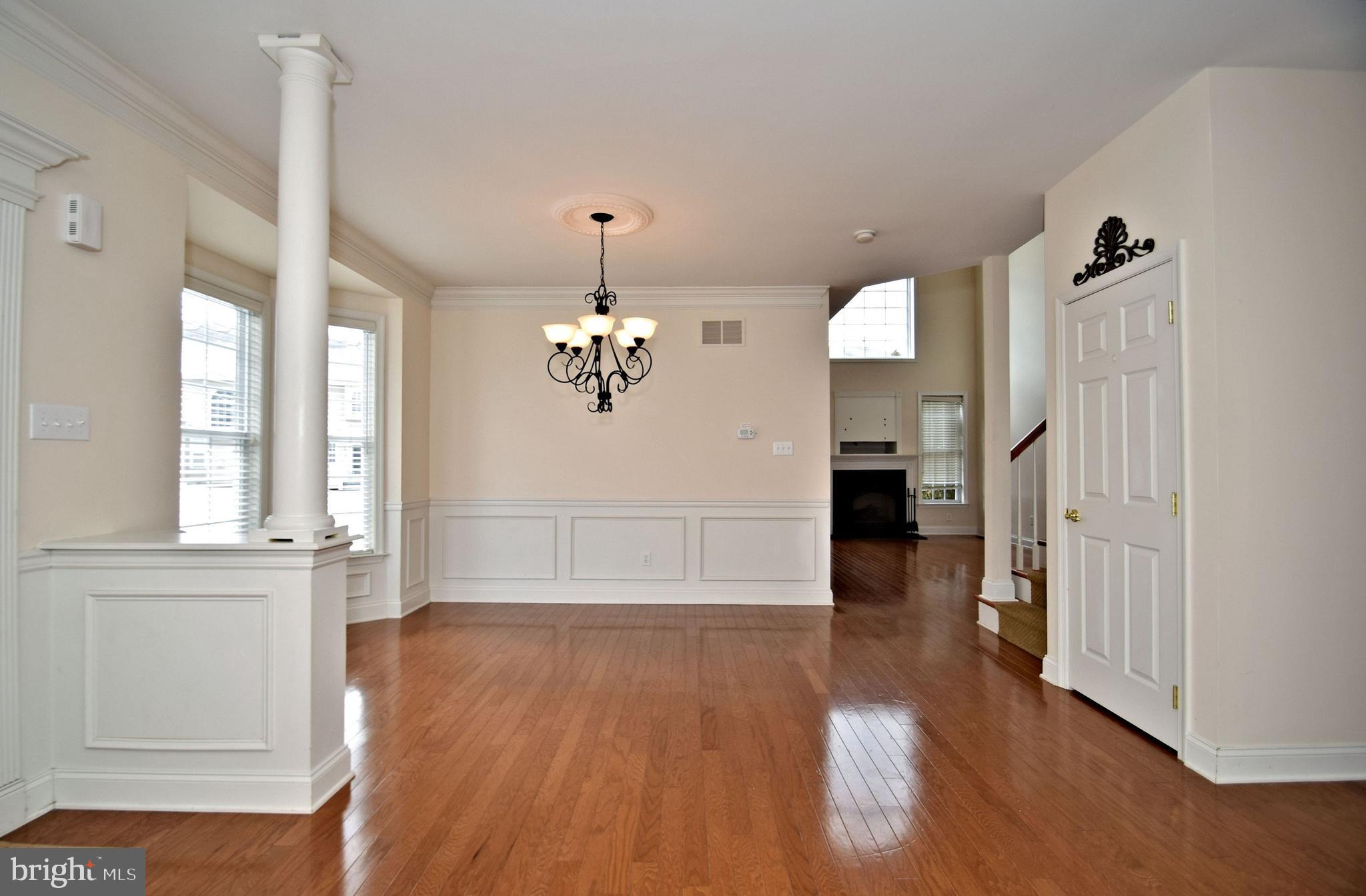 10 Wellington Road Newtown, PA 18940 - Photo 5 of 24 Dining room with wainscoting & crown molding