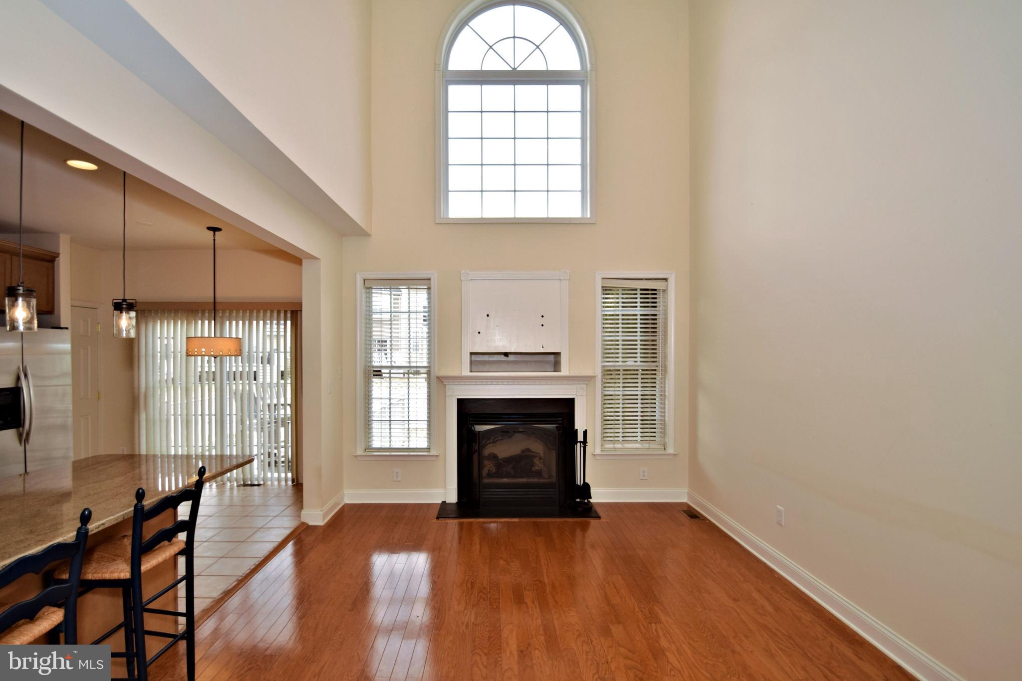 10 Wellington Road Newtown, PA 18940 - Photo 7 of 24 2 story family room w/ gas fireplace