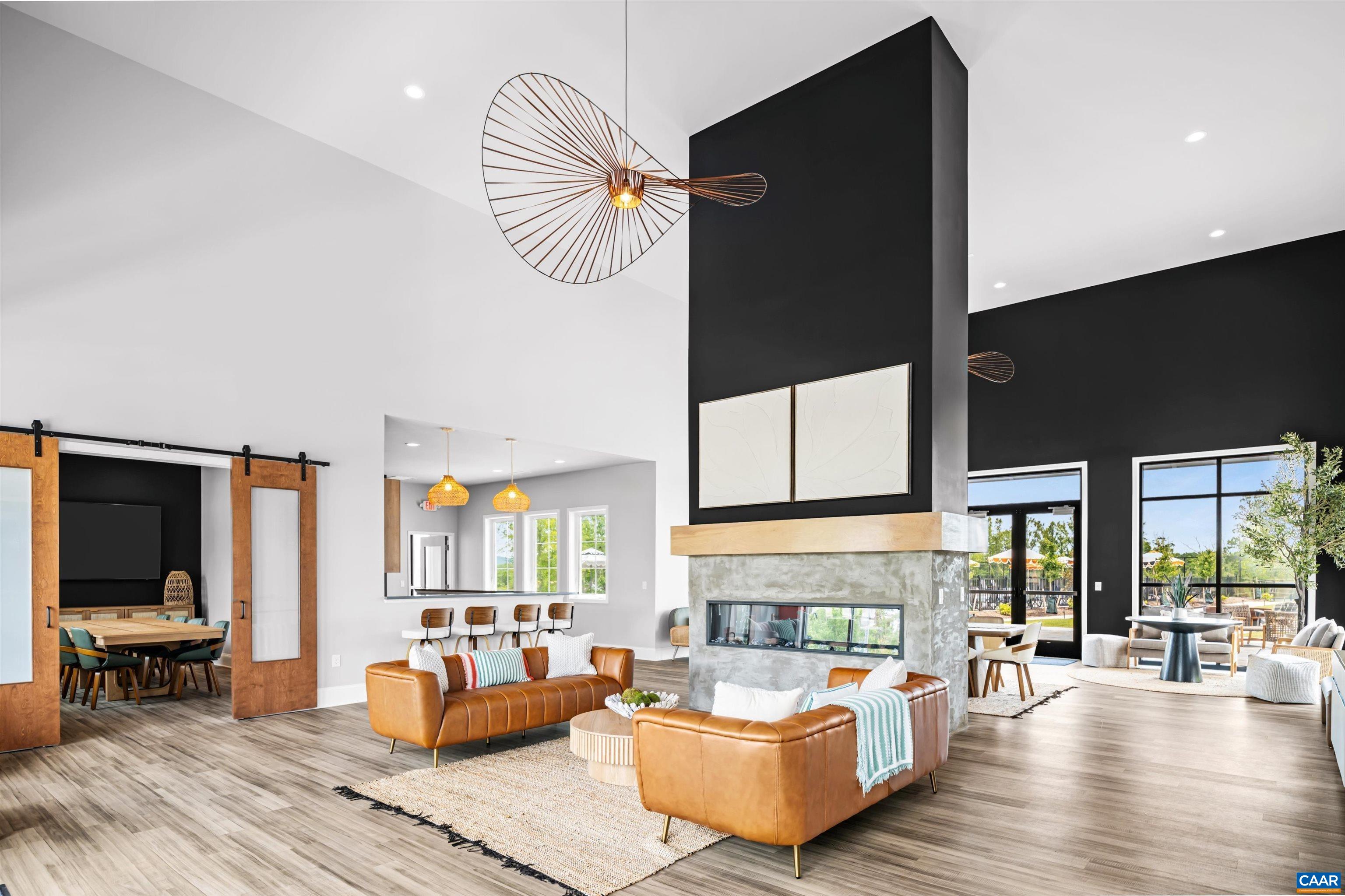 92 Everglades Road Barboursville, VA 22923 - Photo 17 of 22 a living room with furniture bathtub and a flat screen tv