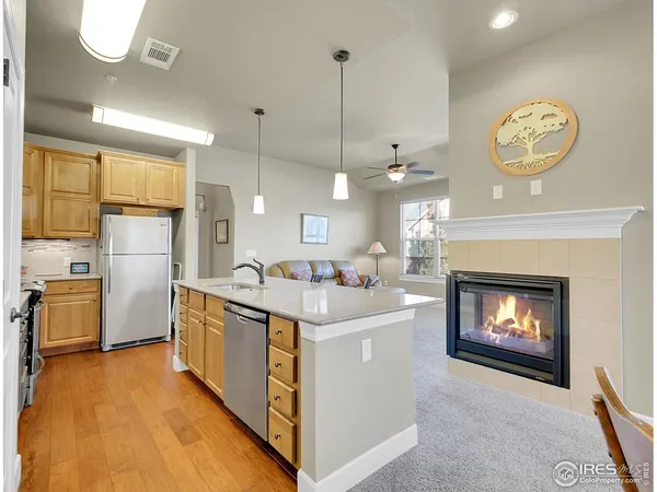 a kitchen with a stove and a fireplace