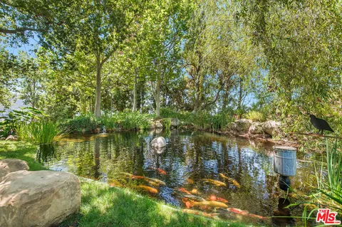 a patio with table and chairs