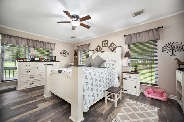 a bed room with a bed and a window