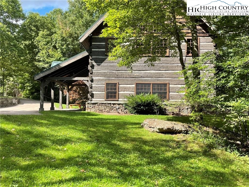 Wolfsbane Trail Todd, NC 28684 - Photo 23 of 29 a view of a house with a yard