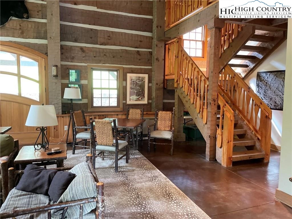 Wolfsbane Trail Todd, NC 28684 - Photo 27 of 29 a living room with furniture and a lamp