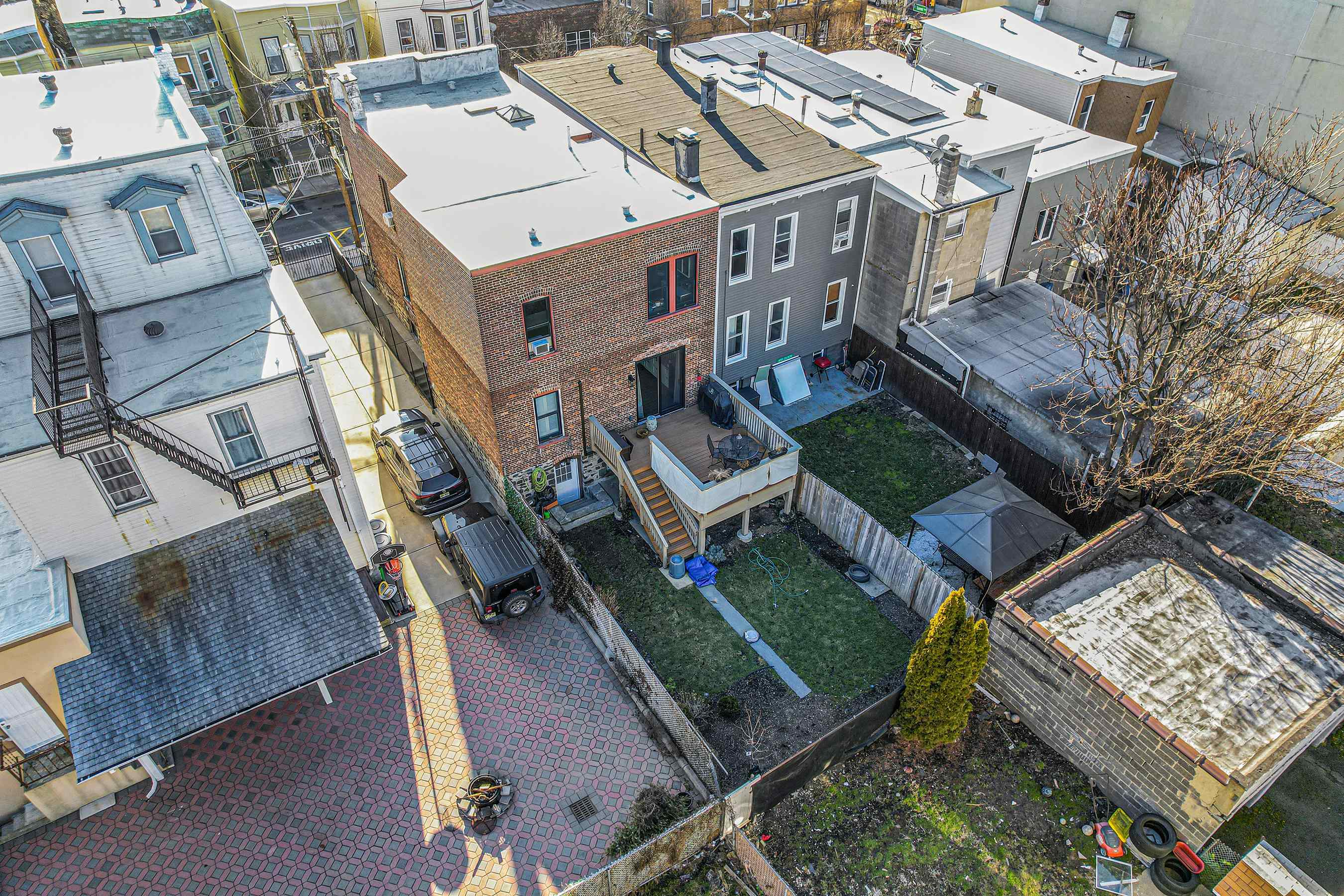 722 27th Street, Unit G Union City, NJ 07087 - Photo 19 of 25 an aerial view of a house with a garden