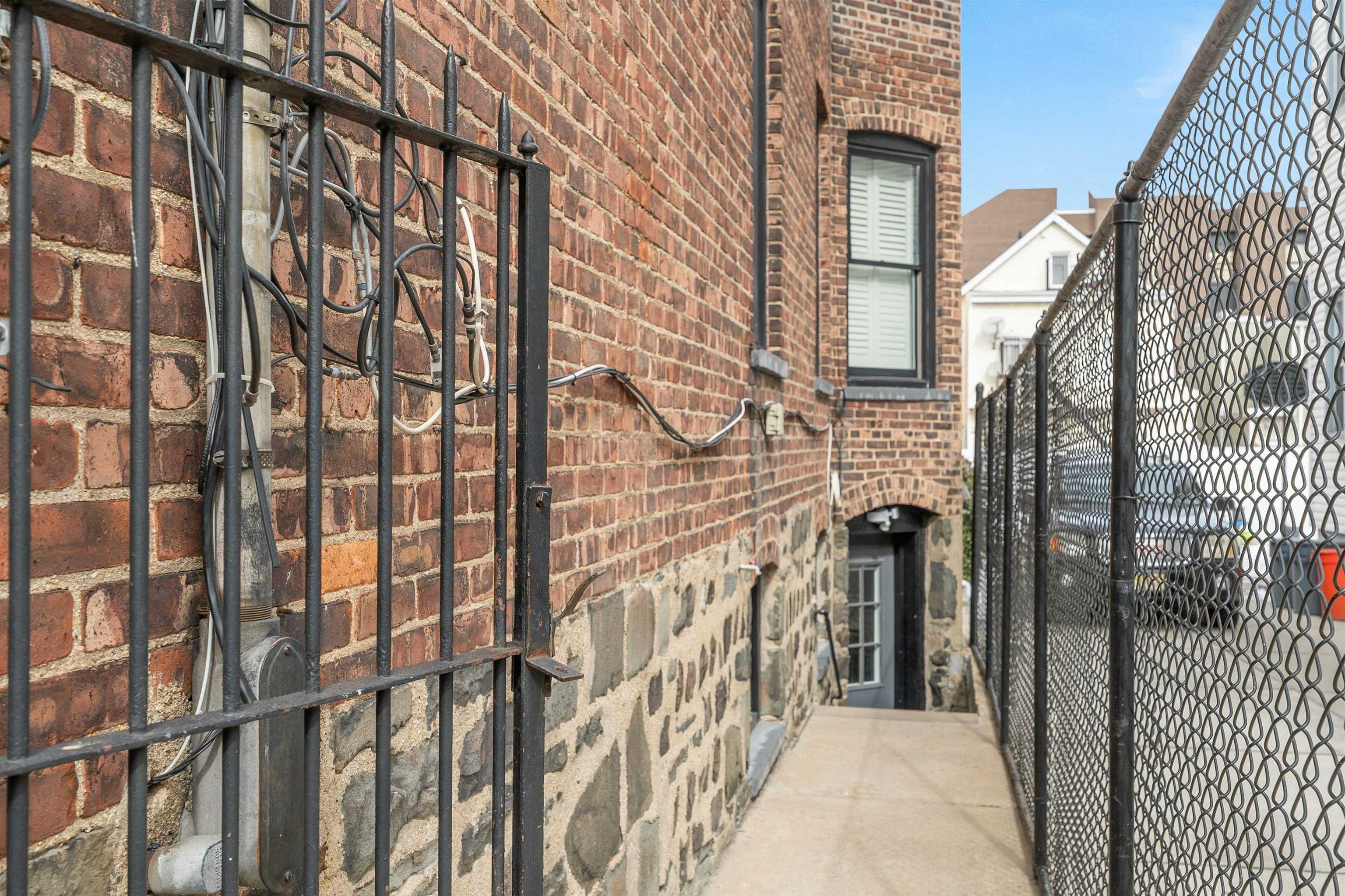 722 27th Street, Unit G Union City, NJ 07087 - Photo 25 of 25 a view of a brick buildings with entryway
