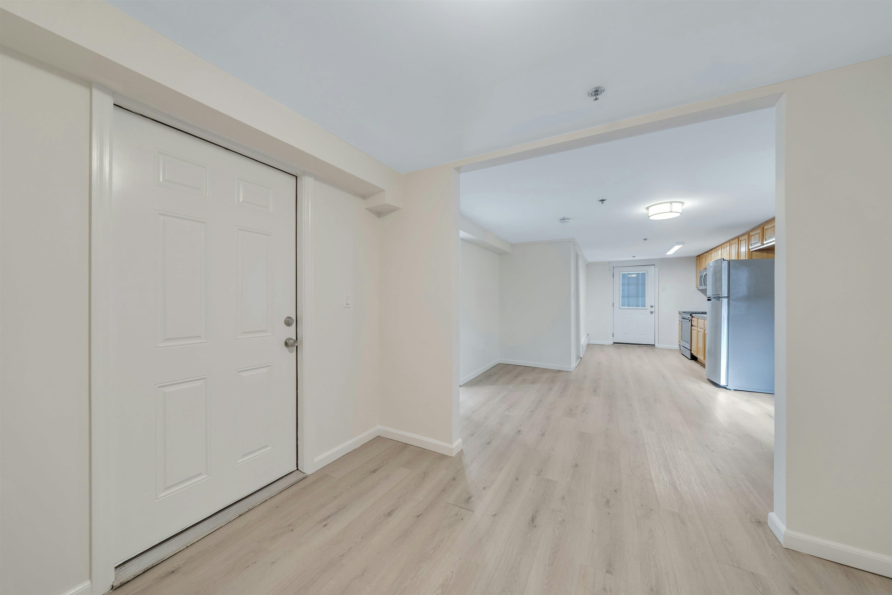 722 27th Street, Unit G Union City, NJ 07087 - Photo 7 of 25 a view of empty room with wooden floor