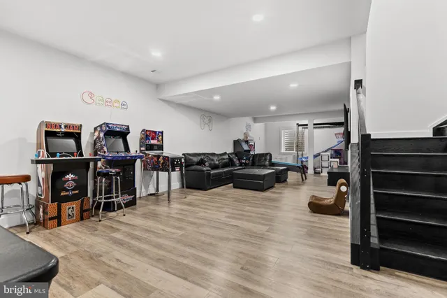 a view of a swimming pool with a table and chairs