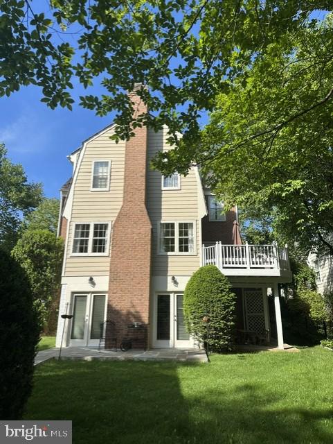270 Beckwith Street Gaithersburg, MD 20878 - Photo 4 of 7 Home back w/walkouts to patio & deck off kitchen