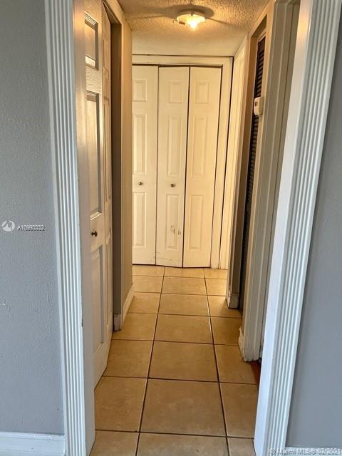 2008 Jackson Street, Unit C7 Hollywood, FL 33020 - Photo 13 of 24 a view of hallway with windows