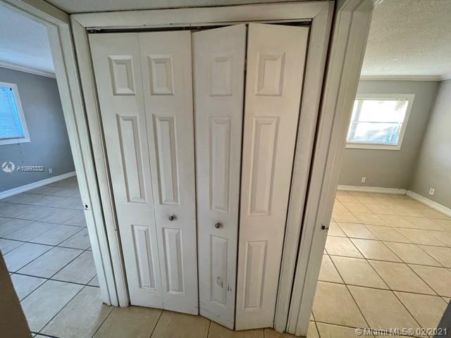 2008 Jackson Street, Unit C7 Hollywood, FL 33020 - Photo 14 of 24 a view of a closet area