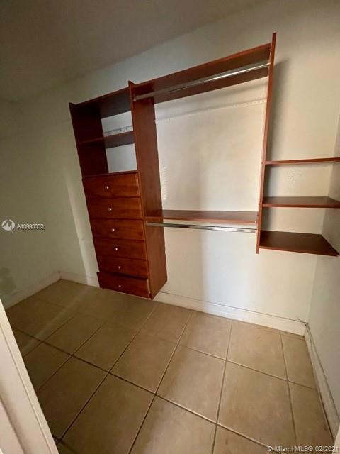 2008 Jackson Street, Unit C7 Hollywood, FL 33020 - Photo 16 of 24 a view of a refrigerator in a kitchen
