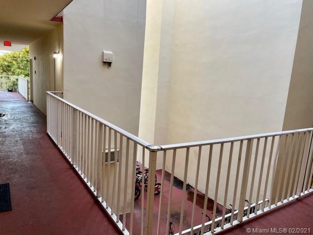 2008 Jackson Street, Unit C7 Hollywood, FL 33020 - Photo 18 of 24 a view of a balcony with staircase