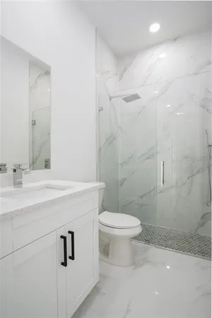 a view of cabinets with sink