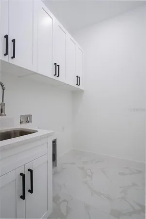 a view of a hallway with a glass door