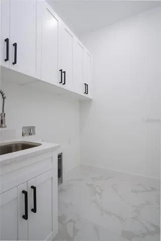 a view of a hallway with a glass door