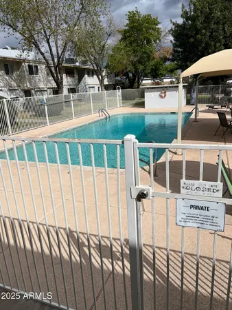 a view of a backyard with a sitting area