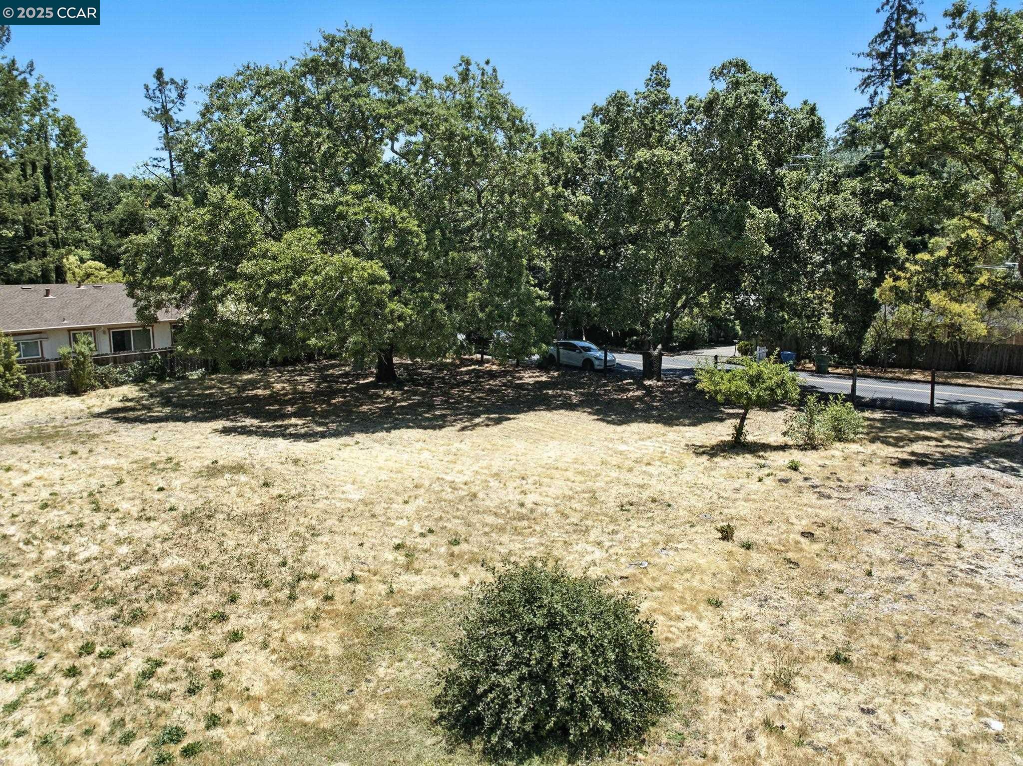 3894 El Nido Ranch Road Lafayette, CA 94549 - Photo 15 of 22 a view of a yard with snow on the road