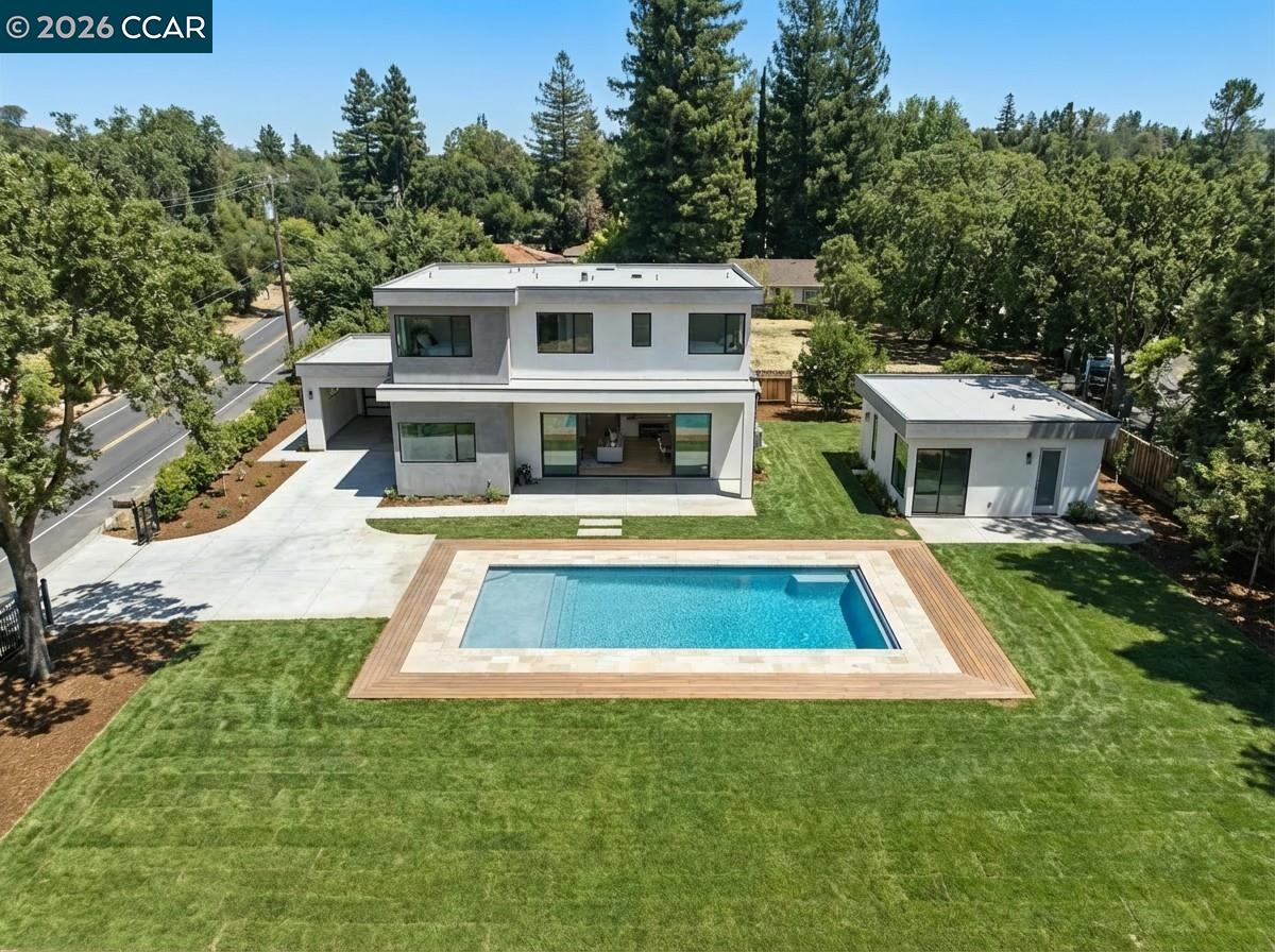 3894 El Nido Ranch Road Lafayette, CA 94549 - Photo 5 of 22 a view of house with a swimming pool