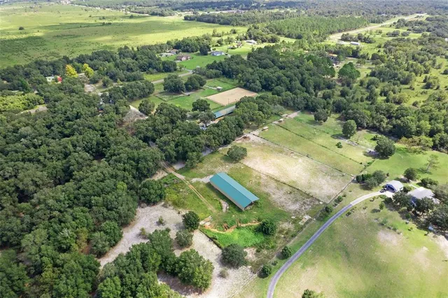 a view of a lake with a yard