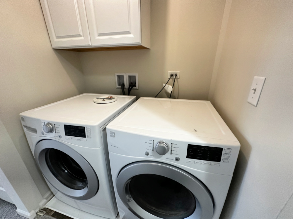 1665 Ruby Drive, Unit 1 Pingree Grove, IL 60140 - Photo 15 of 18 a utility room with dryer and washer