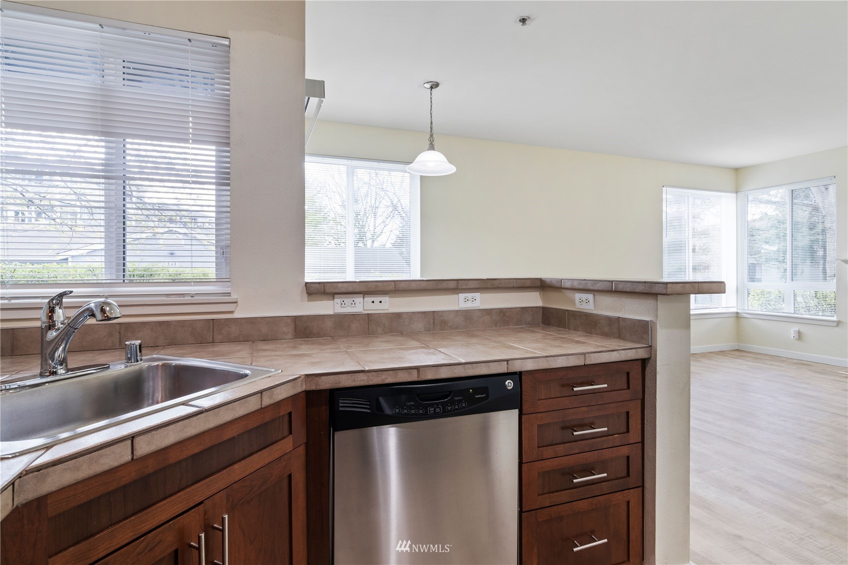 3901 243rd Place Southeast, Unit O102 Bothell, WA 98021 - Photo 12 of 32 a kitchen with a sink and a window