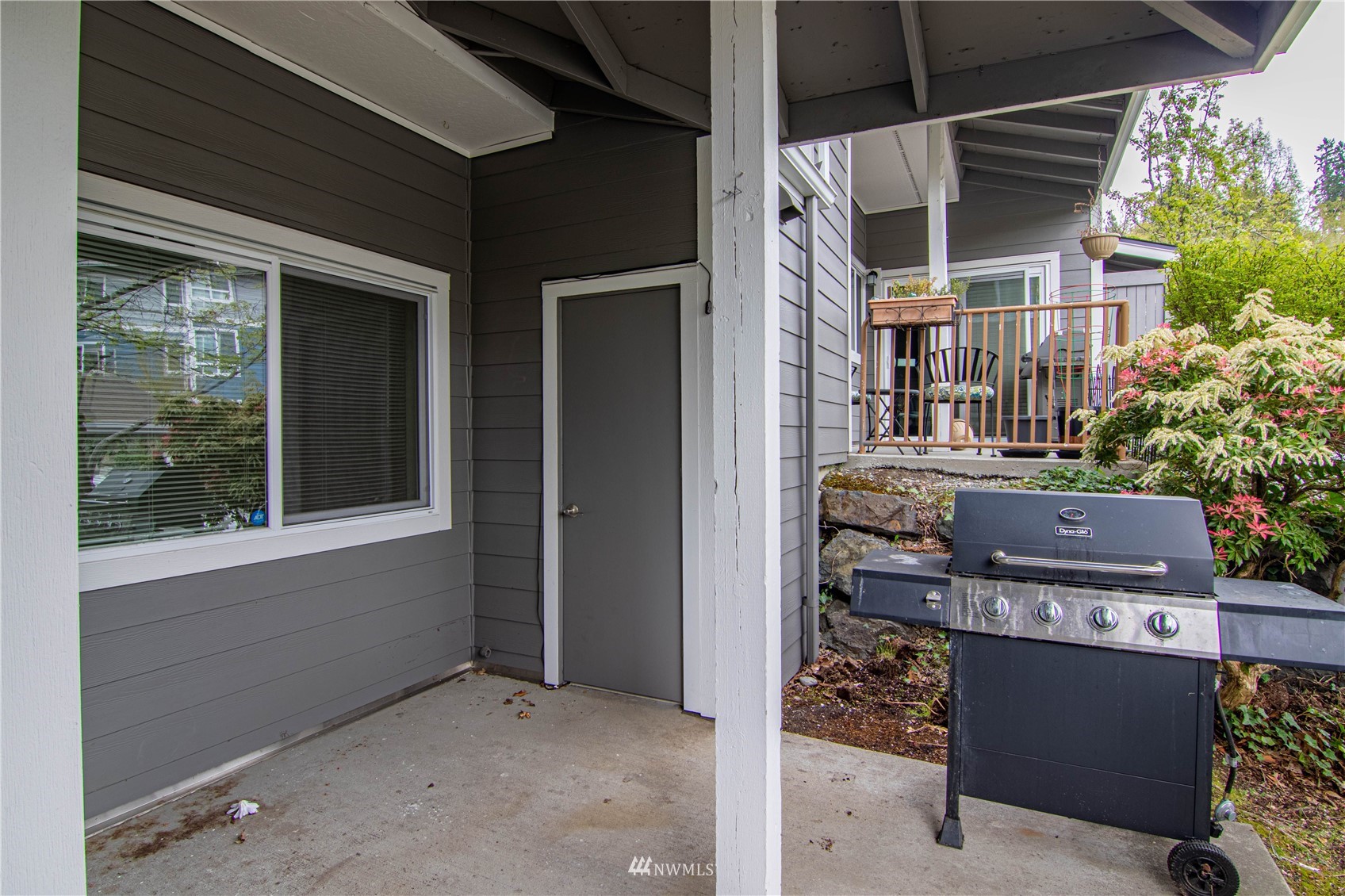 3901 243rd Place Southeast, Unit O102 Bothell, WA 98021 - Photo 15 of 32 front view of a house with a large window
